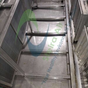 Clean HVAC coils after steam cleaning, showcasing the effectiveness of eco-friendly methods by Steira Air, with visible surface shine and absence of contaminants.