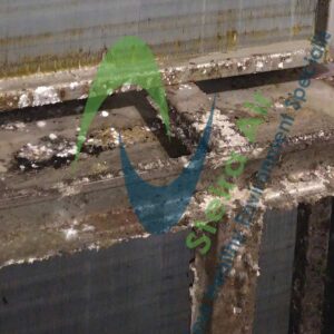 Dirty HVAC coils showing buildup of dirt and grime, with Steira Air logo, highlighting the need for eco-friendly steam coil cleaning services.